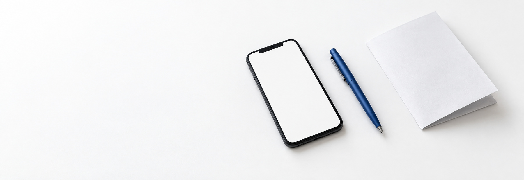 A minimal desk with a phone